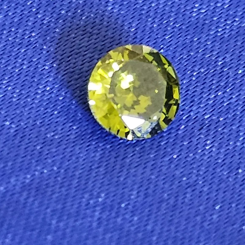 Facetted Round Spinel - Scandinavian Gem Design