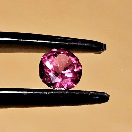 Facetted round Umbalite Garnet