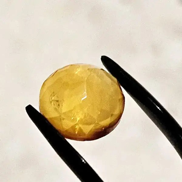 Golden Glow: 1.5ct Facetted Round Amber