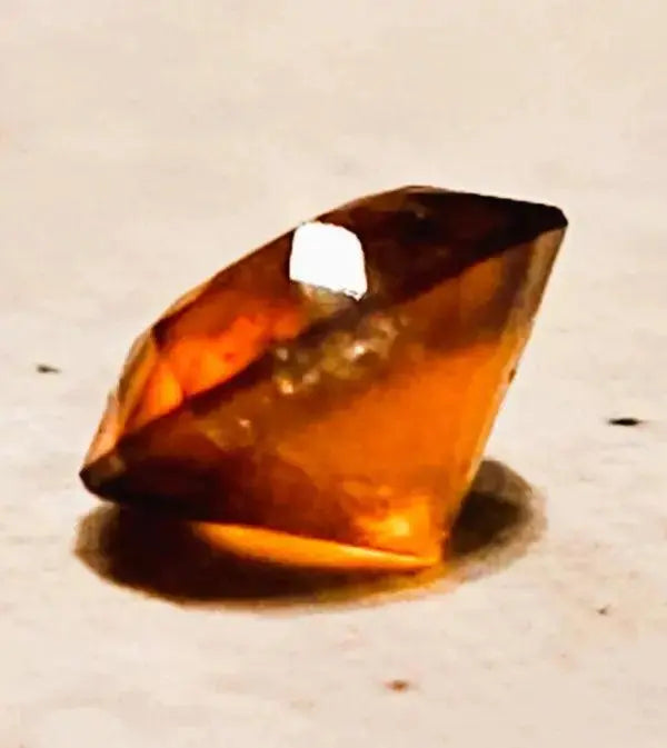 Hessonite Brilliance: 1.1ct Round Facetted Gem - Scandinavian Gem Design