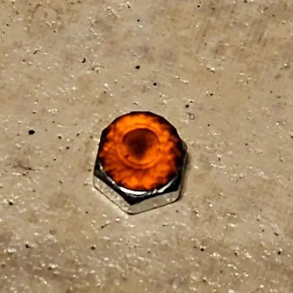 Hessonite Brilliance: 1.1ct Round Facetted Gem - Scandinavian Gem Design