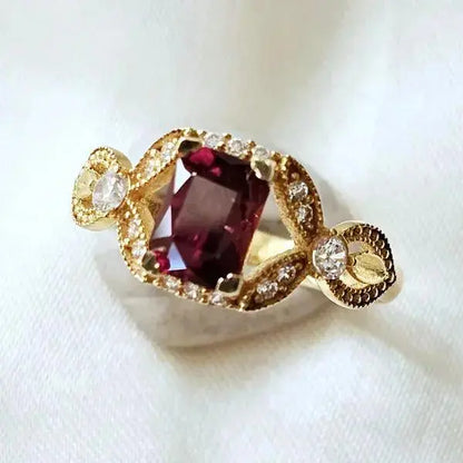 Deep Red Delight: 18ct Gold Garnet Ring - Scandinavian Gem Design