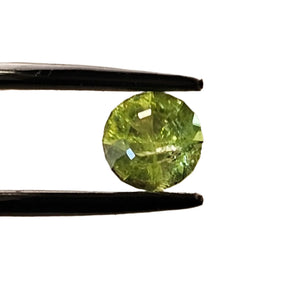 Radiant Green: Facetted Round Peridot - Scandinavian Gem Design