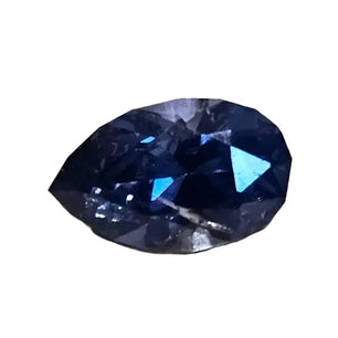 Sapphire Elegance: Facetted Blue Teardrop Scandinavian Gem Design