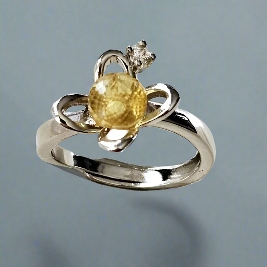 Silver plated ring with facetted yellow Amber